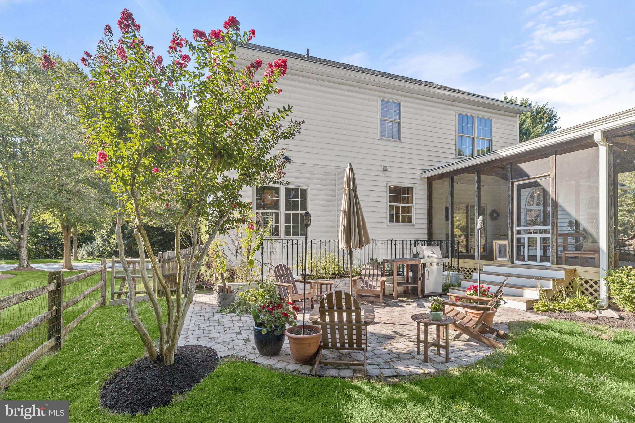 5911 Fall Moon Ride Clarksville, MD 21029 - Photo 5 of 65 Landscaped yard with expansive patio