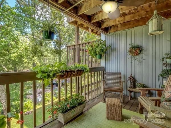 a view of balcony with furniture