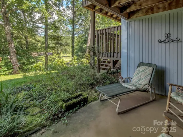 a view of a yard with an outdoor space
