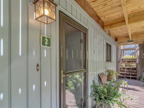 a front view of a house with a glass door