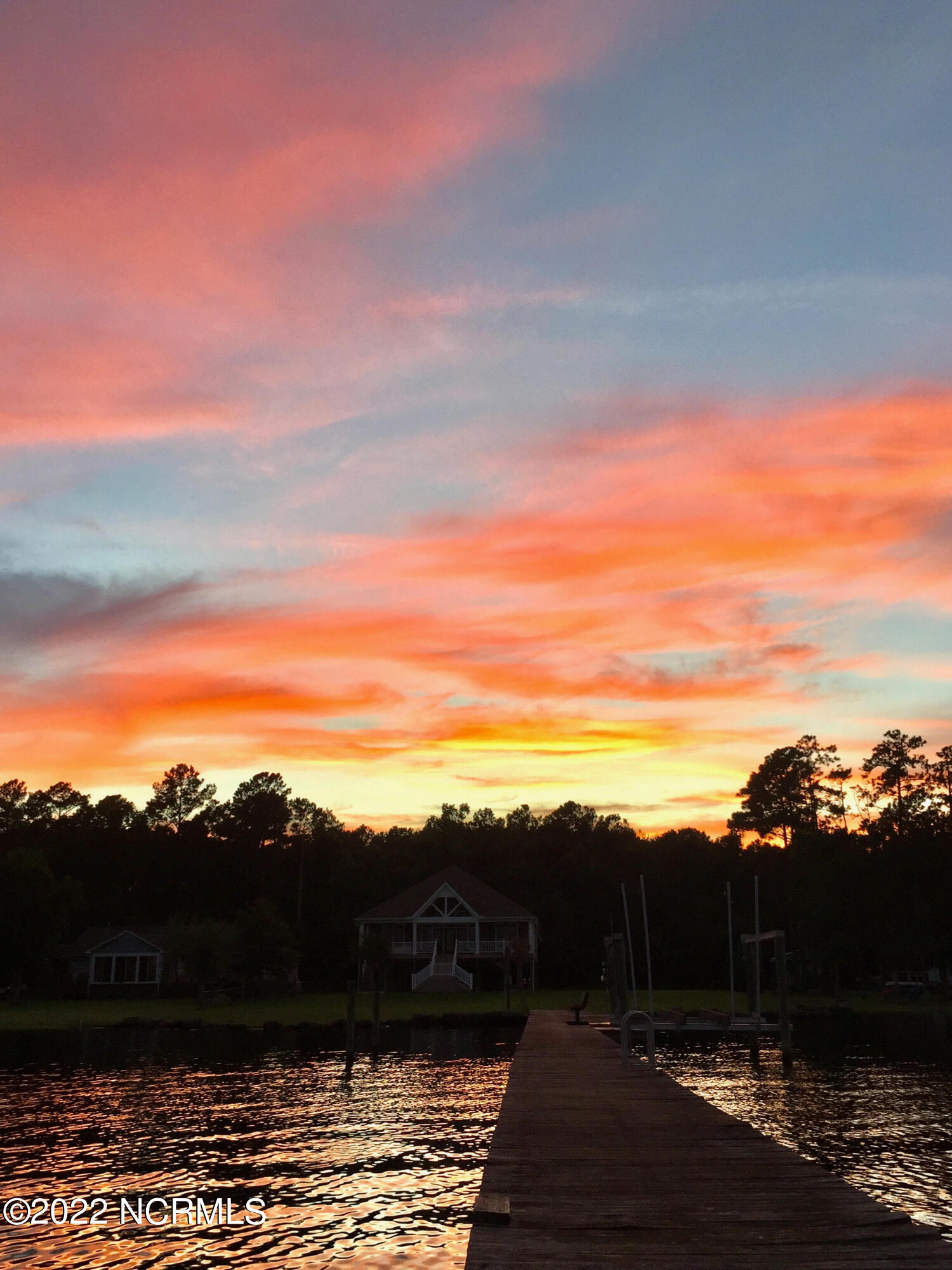 637 Harper Road Bayboro, NC 28515 - Photo 49 of 50 Harper sunset with house