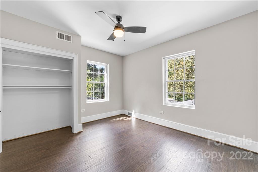 844 Lincolnton Road Salisbury, NC 28144 - Photo 17 of 36 a view of an empty room with wooden floor and a window