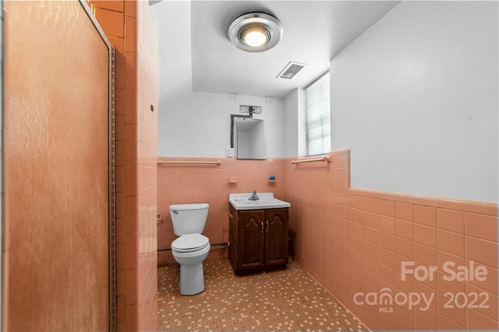 844 Lincolnton Road Salisbury, NC 28144 - Photo 25 of 36 a bathroom with a toilet and a sink