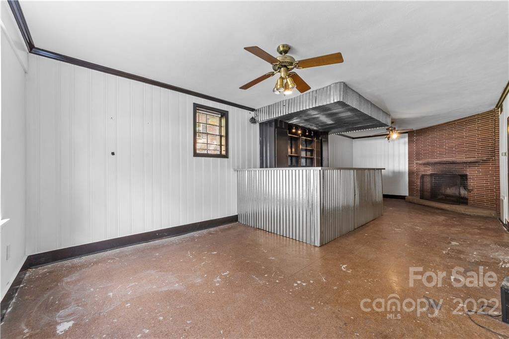 844 Lincolnton Road Salisbury, NC 28144 - Photo 28 of 36 a view of a livingroom with a ceiling fan and window