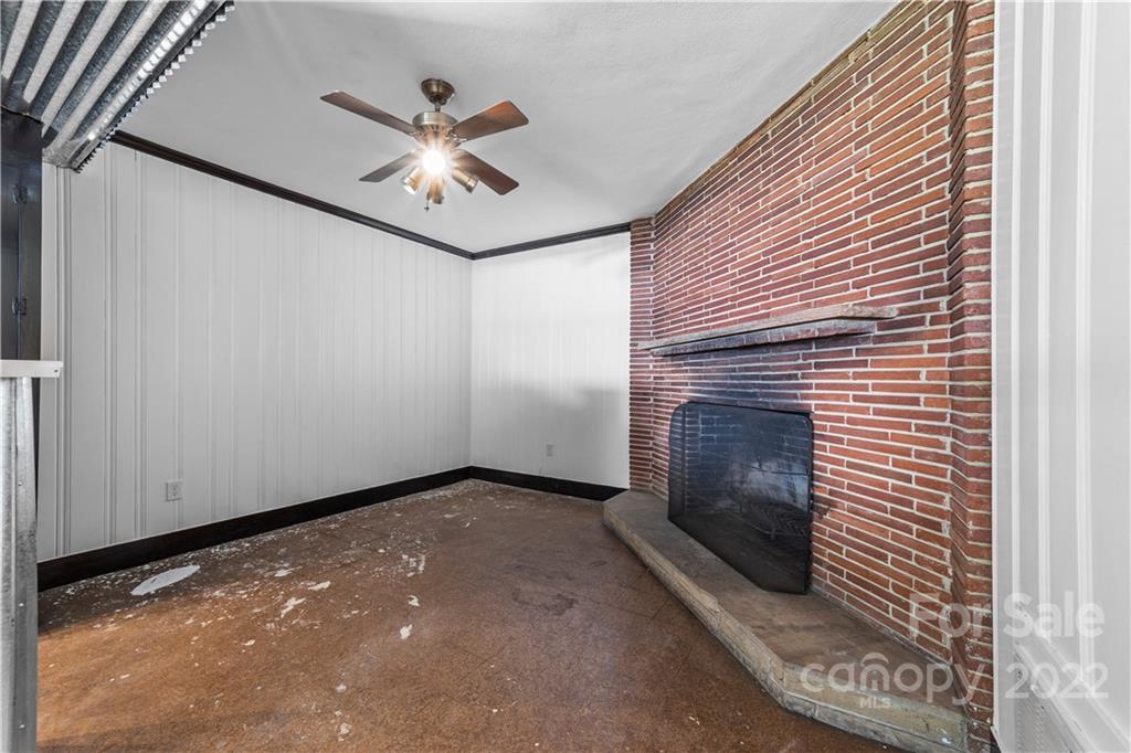 844 Lincolnton Road Salisbury, NC 28144 - Photo 29 of 36 a view of an empty room with a ceiling fan