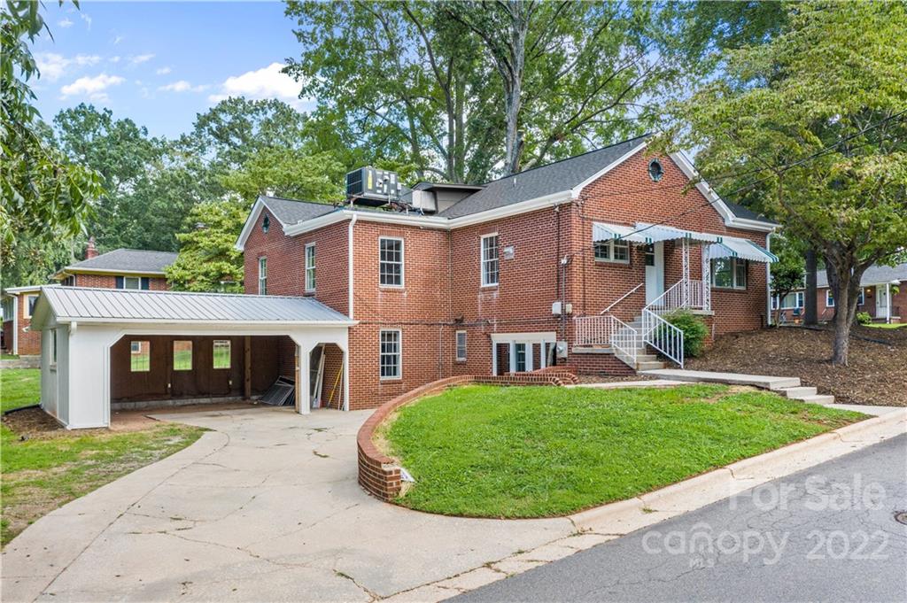 844 Lincolnton Road Salisbury, NC 28144 - Photo 31 of 36 a front view of a house with a garden