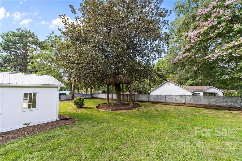 844 Lincolnton Road Salisbury, NC 28144 - Photo 36 of 36 a view of a house with backyard and tree