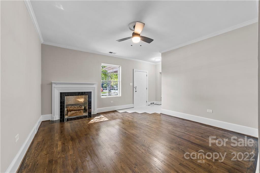 844 Lincolnton Road Salisbury, NC 28144 - Photo 9 of 36 an empty room with windows fireplace and a sink