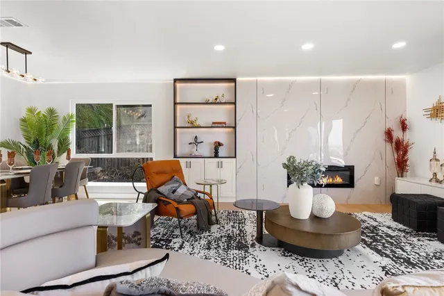 a kitchen with stainless steel appliances granite countertop a sink and cabinets