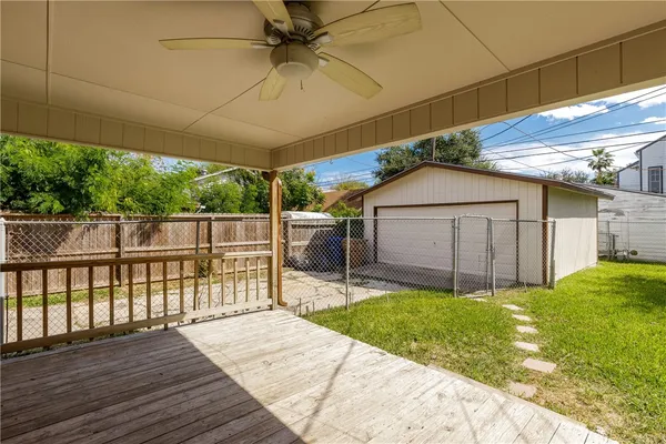 a view of a backyard with a small cabin