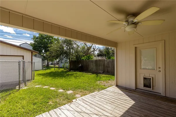 a view of a backyard with a garden