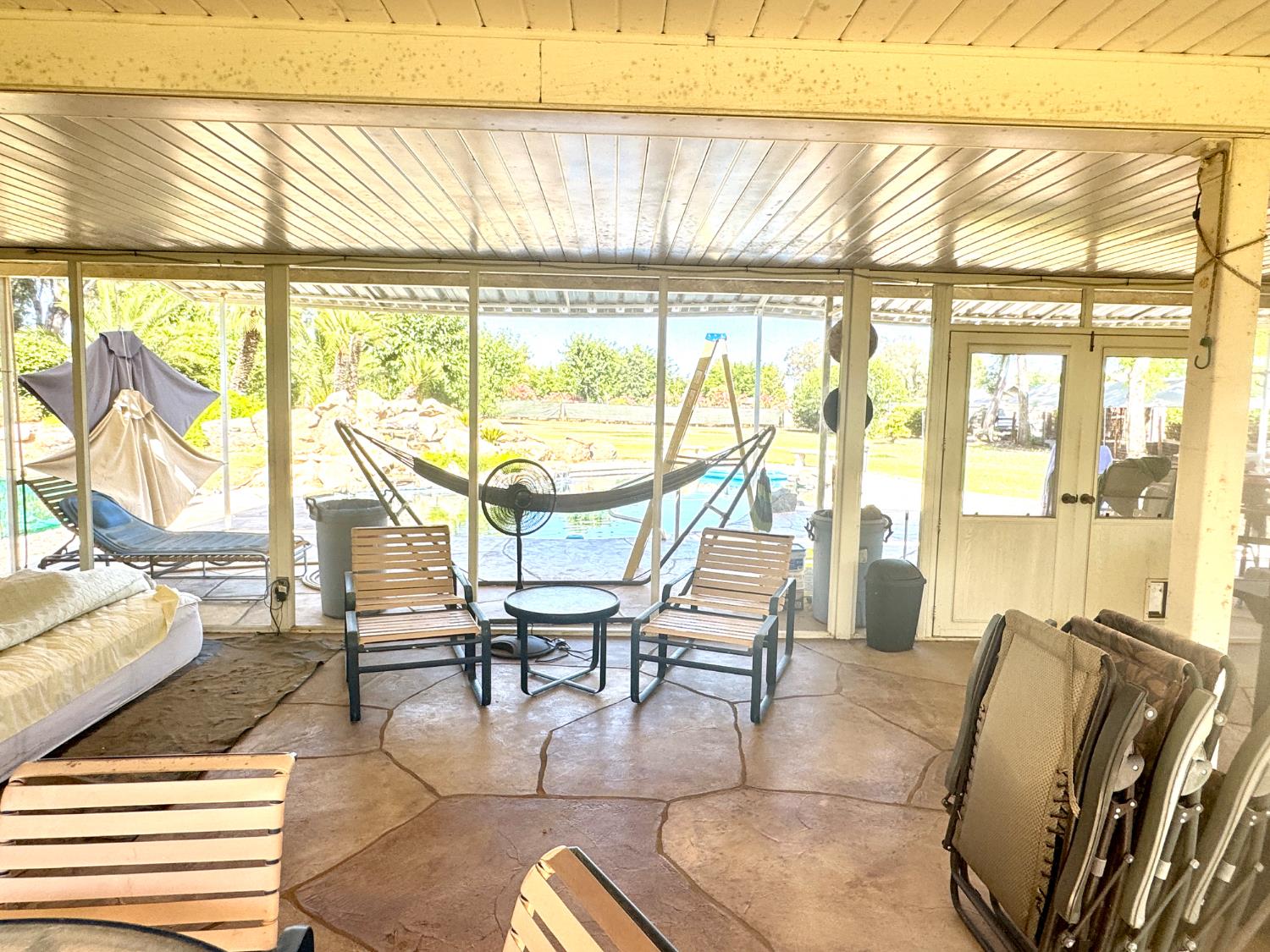 5476 Greenwood Avenue Clovis, CA 93619 - Photo 18 of 19 a dining room with furniture water view and wooden floor