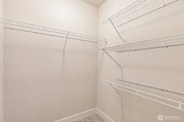 a view of a room with racks on the wall