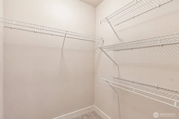 a view of a room with racks on the wall