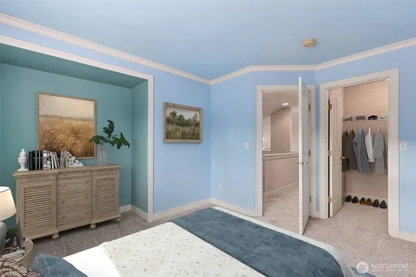 a view of a bedroom with cabinet and mirror