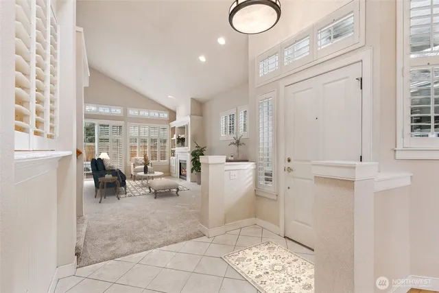 a view of livingroom with furniture and floor to ceiling window