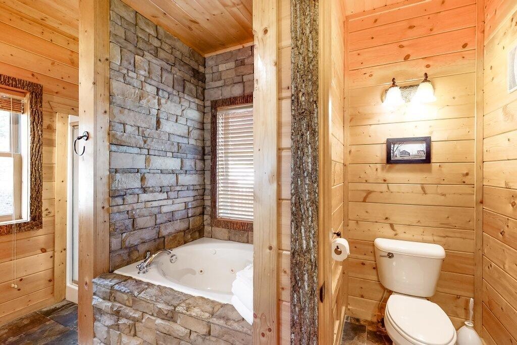2556 Treehouse Lane Sevierville, TN 37876 - Photo 15 of 24 a bathroom with a toilet and a shower