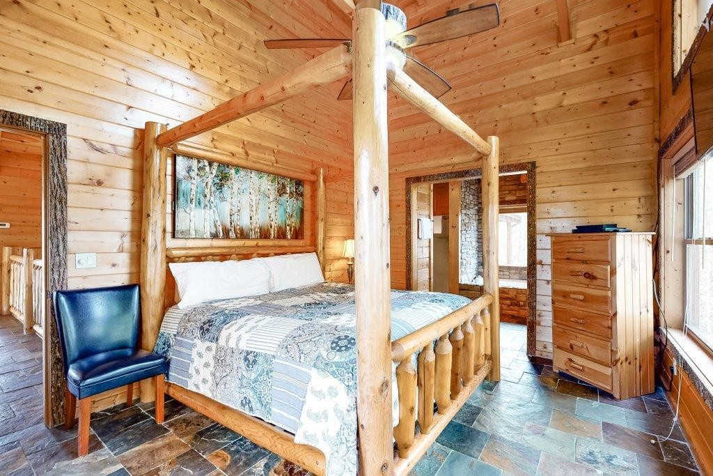 2556 Treehouse Lane Sevierville, TN 37876 - Photo 16 of 24 a bedroom with furniture and a window