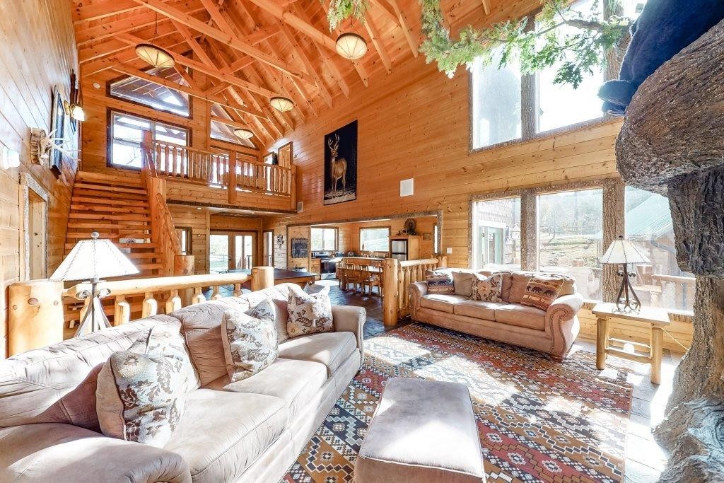 2556 Treehouse Lane Sevierville, TN 37876 - Photo 4 of 24 a living room with furniture and a large window