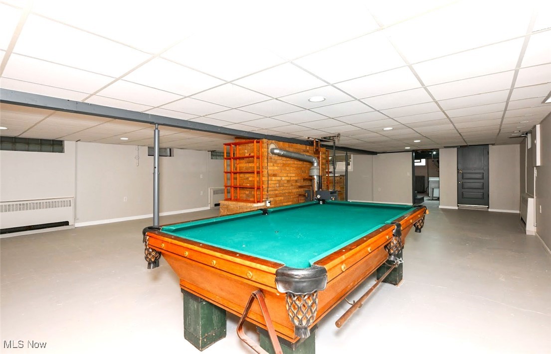 4597 Rock Cut Road Barberton, OH 44203 - Photo 27 of 44 *FINISHED BASEMENT (ADD FLOORING OF CHOICE) RECREATION ROOM GREAT FOR ENTERTAINING W/2ND FIREPLACE, ALSO WALKS OUT (UP STAIRS) TO THE BACK YARD ~