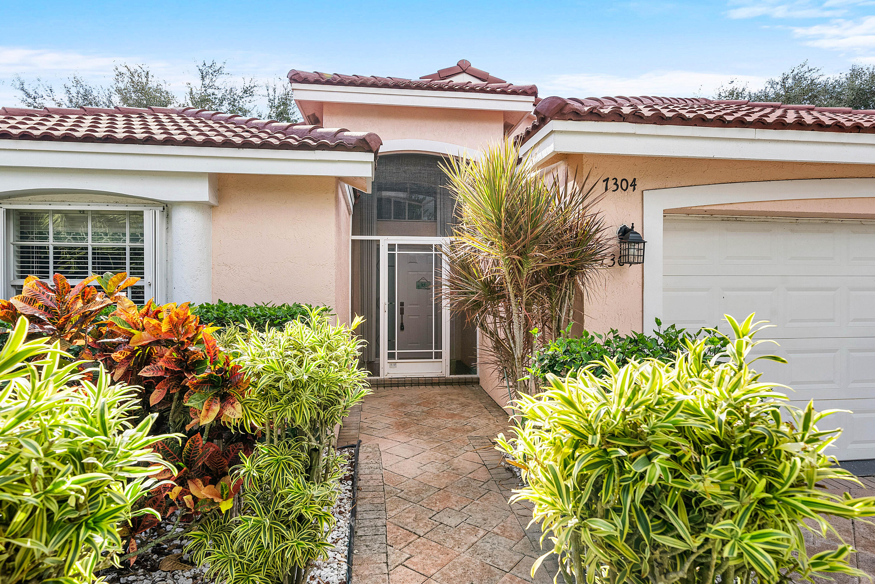 7304 Modena Drive Boynton Beach, FL 33437 - Photo 2 of 35 front view of a house