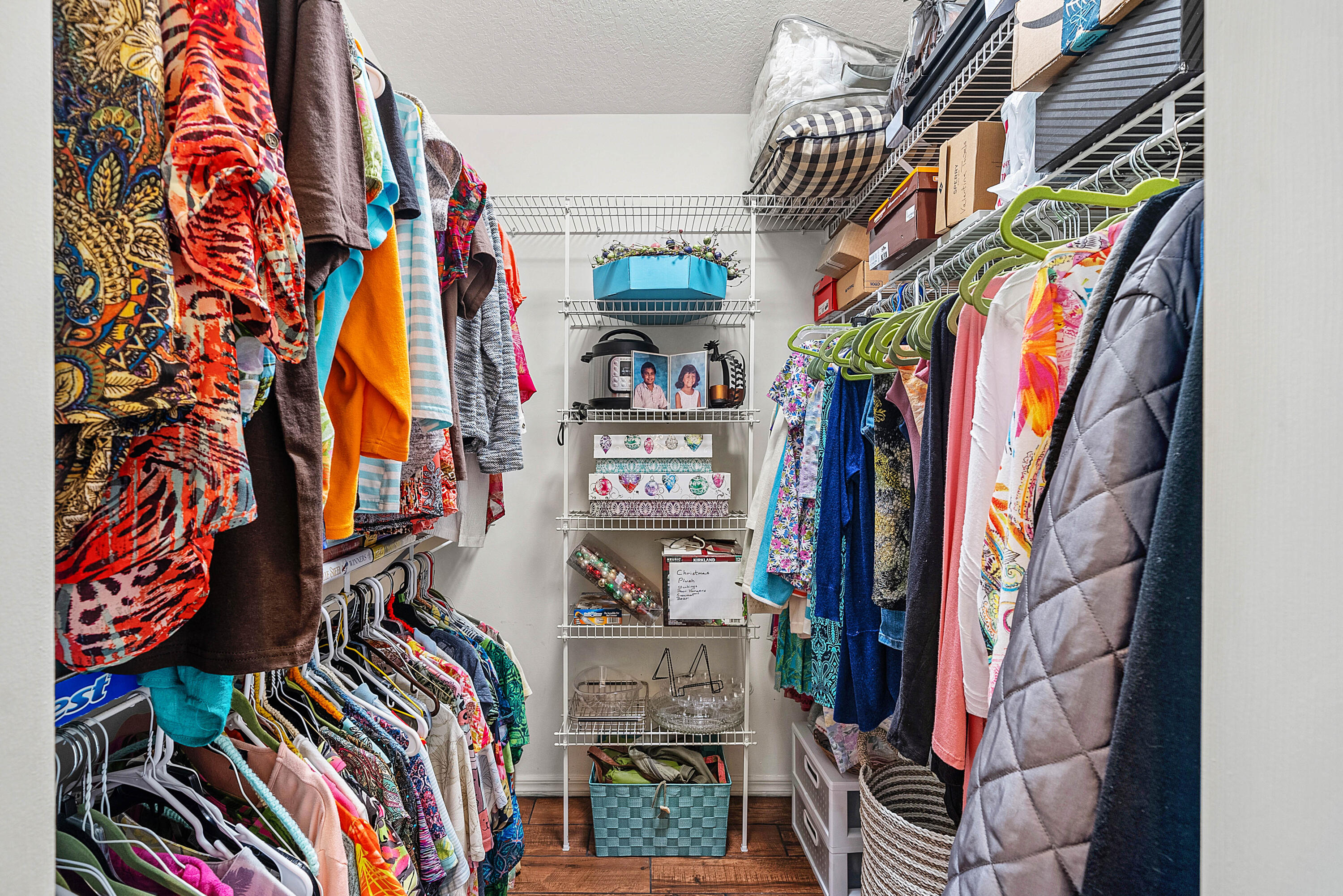 7304 Modena Drive Boynton Beach, FL 33437 - Photo 21 of 35 a view of walk in closet with clothes