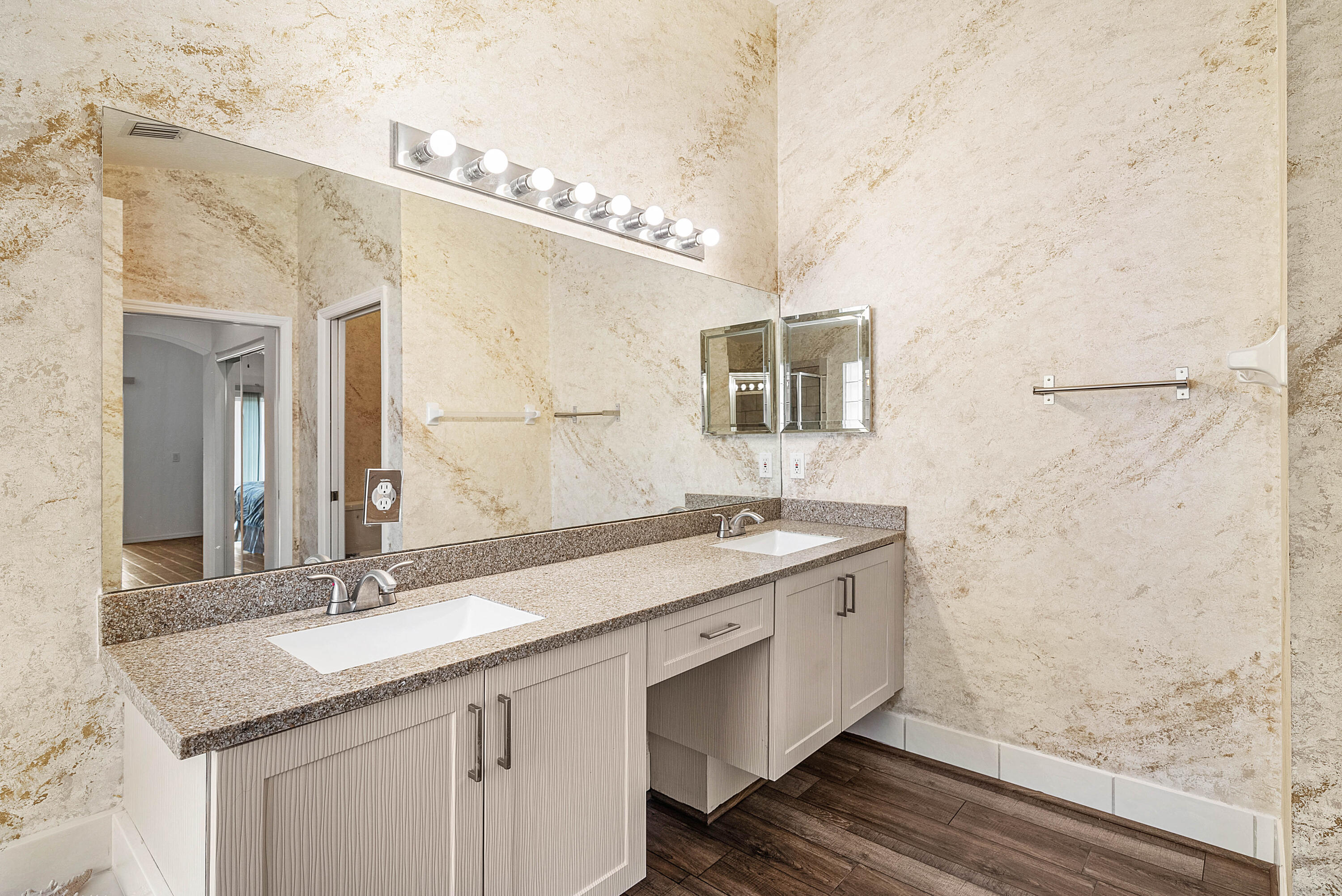7304 Modena Drive Boynton Beach, FL 33437 - Photo 23 of 35 a bathroom with a granite countertop sink a mirror and shower