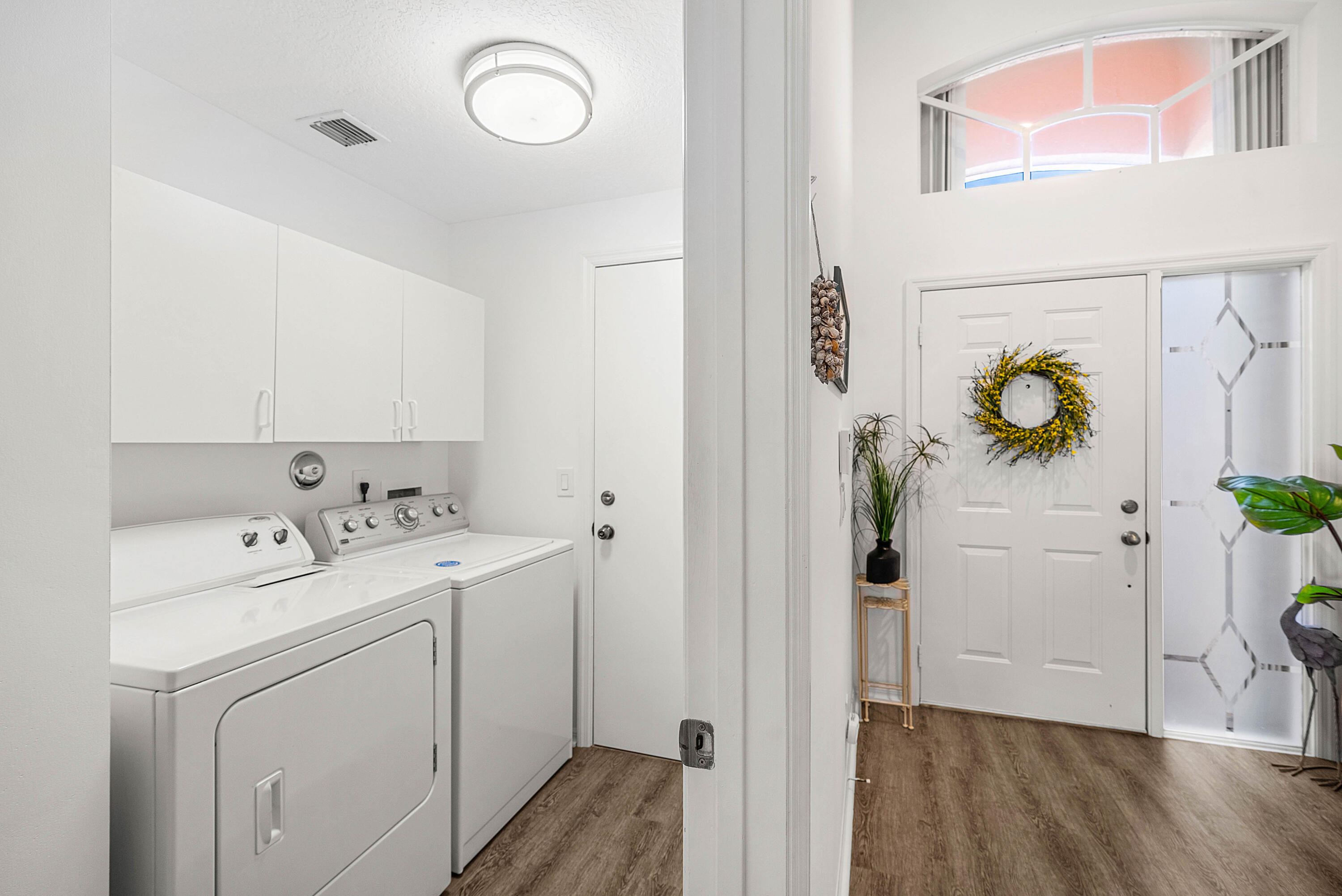7304 Modena Drive Boynton Beach, FL 33437 - Photo 28 of 35 a view of bathroom with washer and dryer