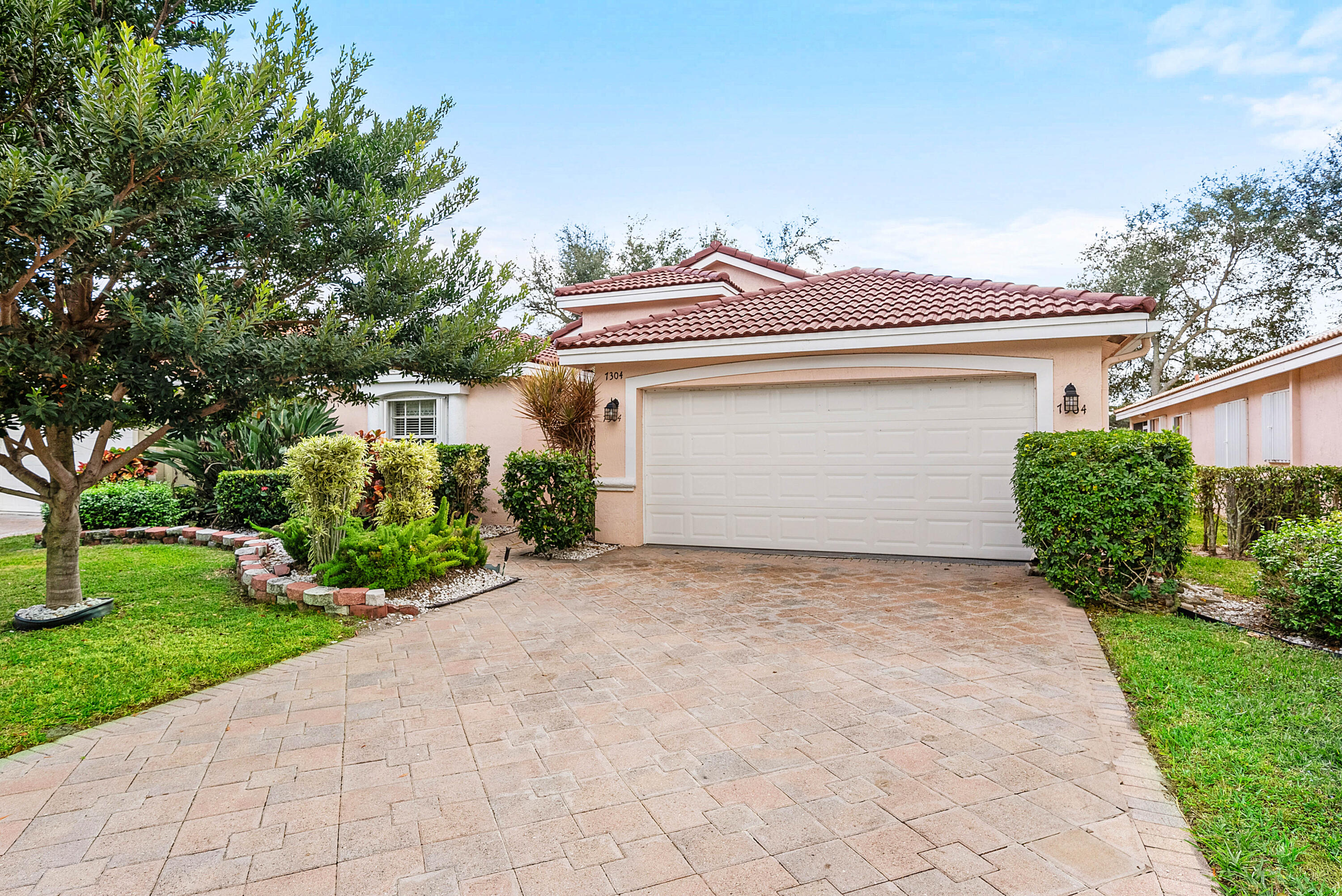 7304 Modena Drive Boynton Beach, FL 33437 - Photo 35 of 35 a house with a outdoor space