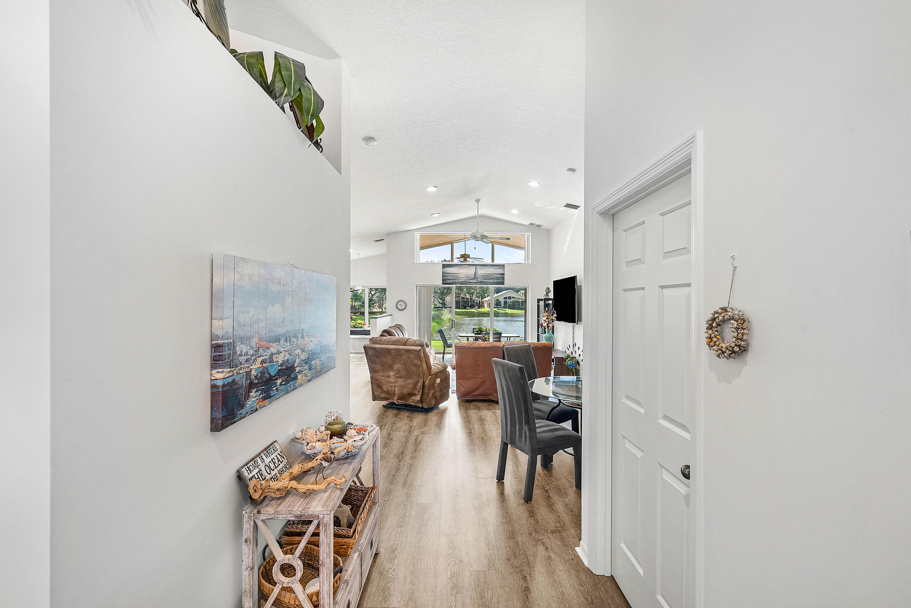 7304 Modena Drive Boynton Beach, FL 33437 - Photo 4 of 35 a living room with furniture and wooden floor