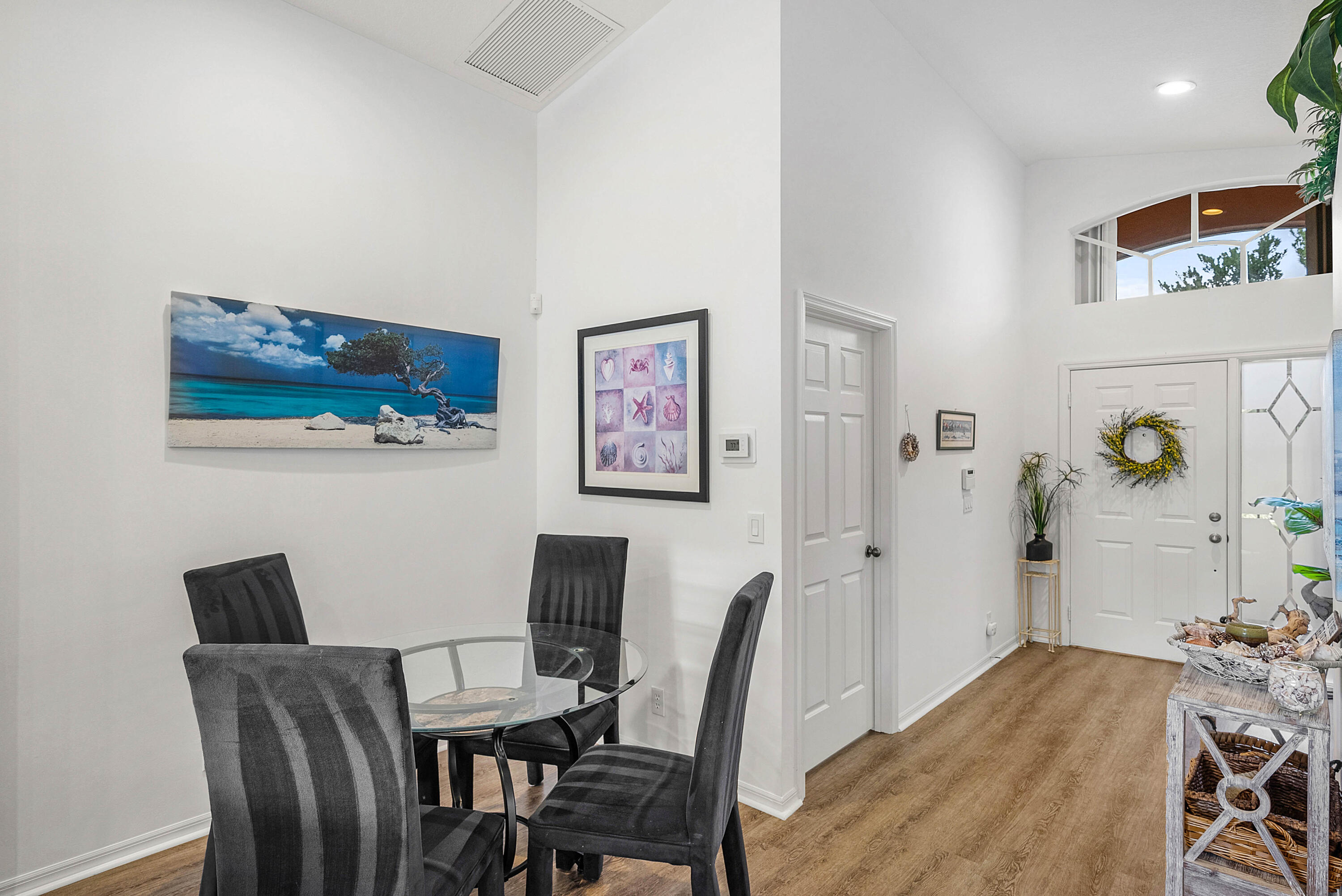 7304 Modena Drive Boynton Beach, FL 33437 - Photo 8 of 35 a view of a dining room with furniture