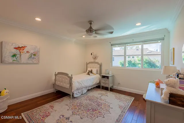 a bed room with a bed and a window