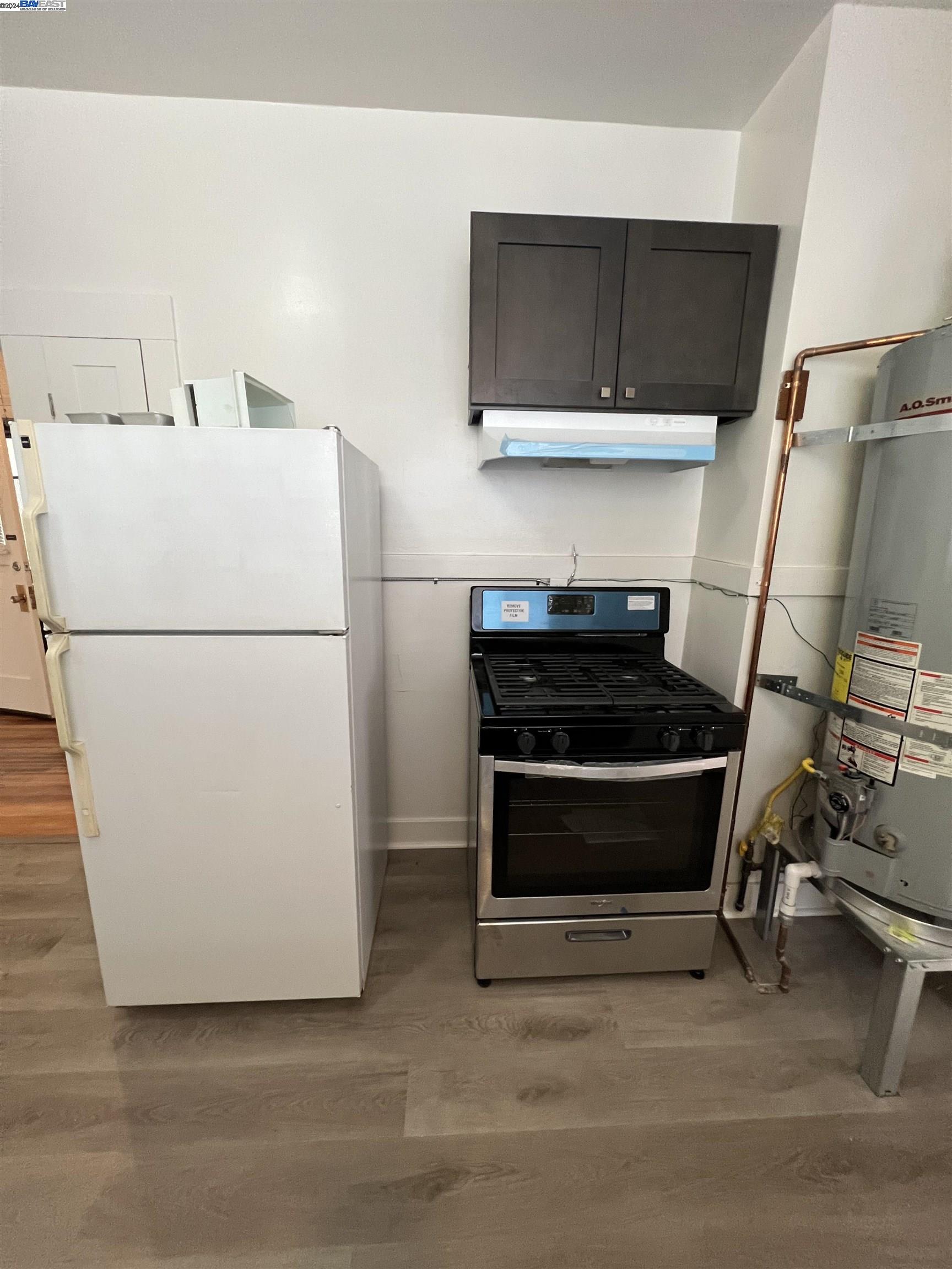 2418 Ashby Avenue, Unit # 2 Berkeley, CA 94705 - Photo 13 of 15 a utility room with washer and dryer