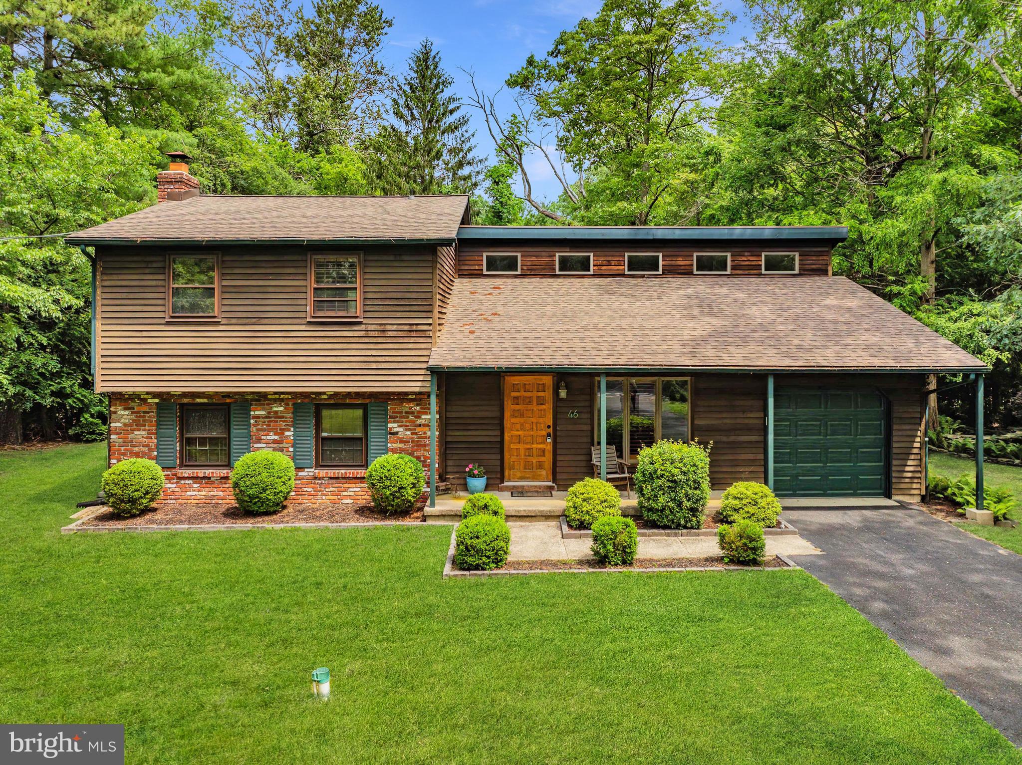 46 Grassy Lake Road Shamong, NJ 08088 - Photo 1 of 47 a view of a house with backyard and garden