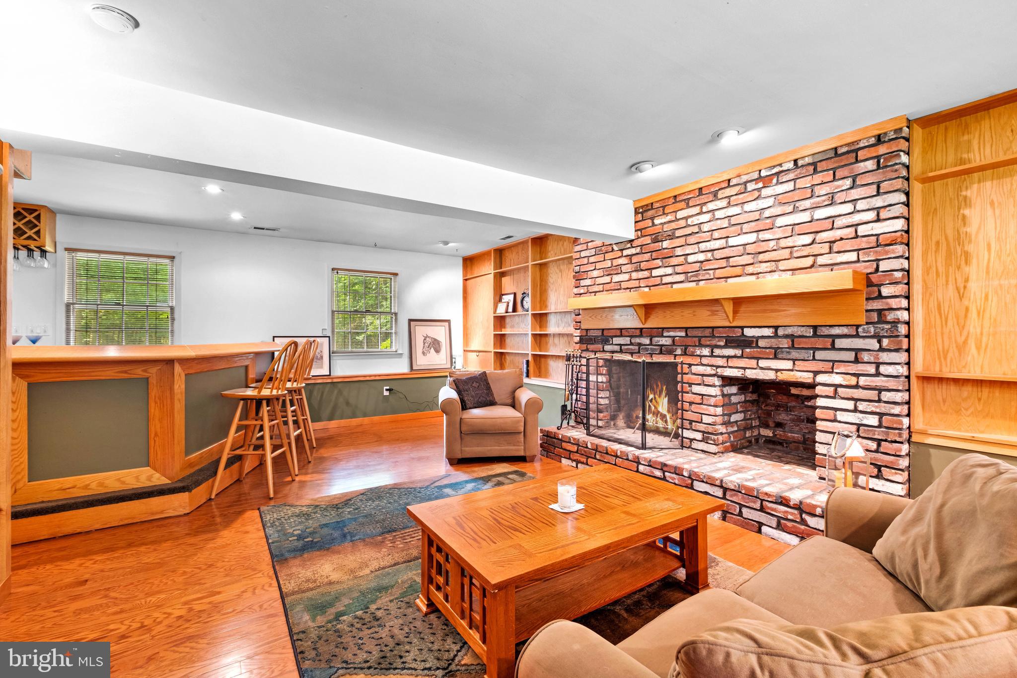 46 Grassy Lake Road Shamong, NJ 08088 - Photo 25 of 47 a living room with furniture and a floor to ceiling window