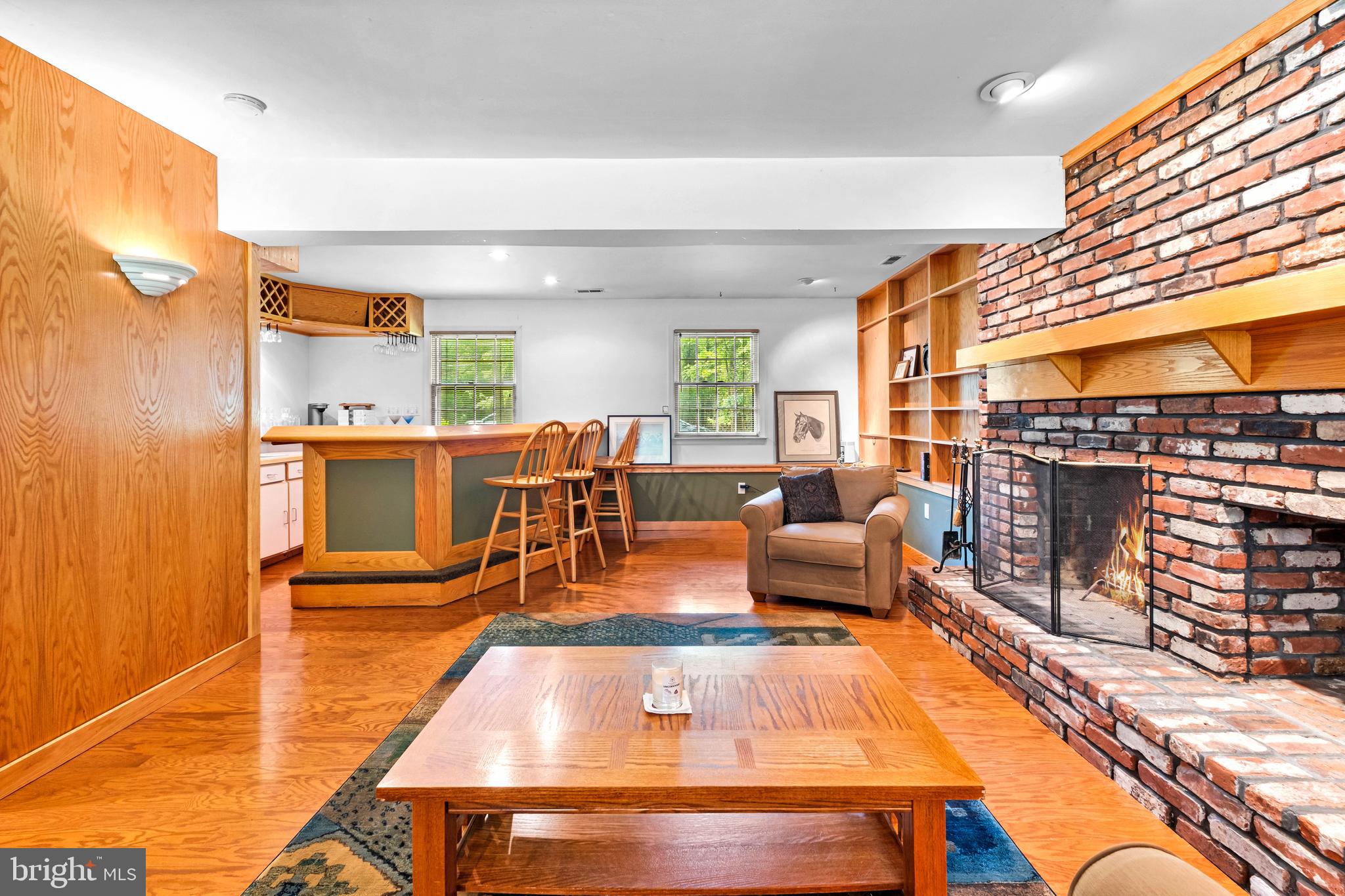 46 Grassy Lake Road Shamong, NJ 08088 - Photo 26 of 47 a living room with fireplace furniture and a large window
