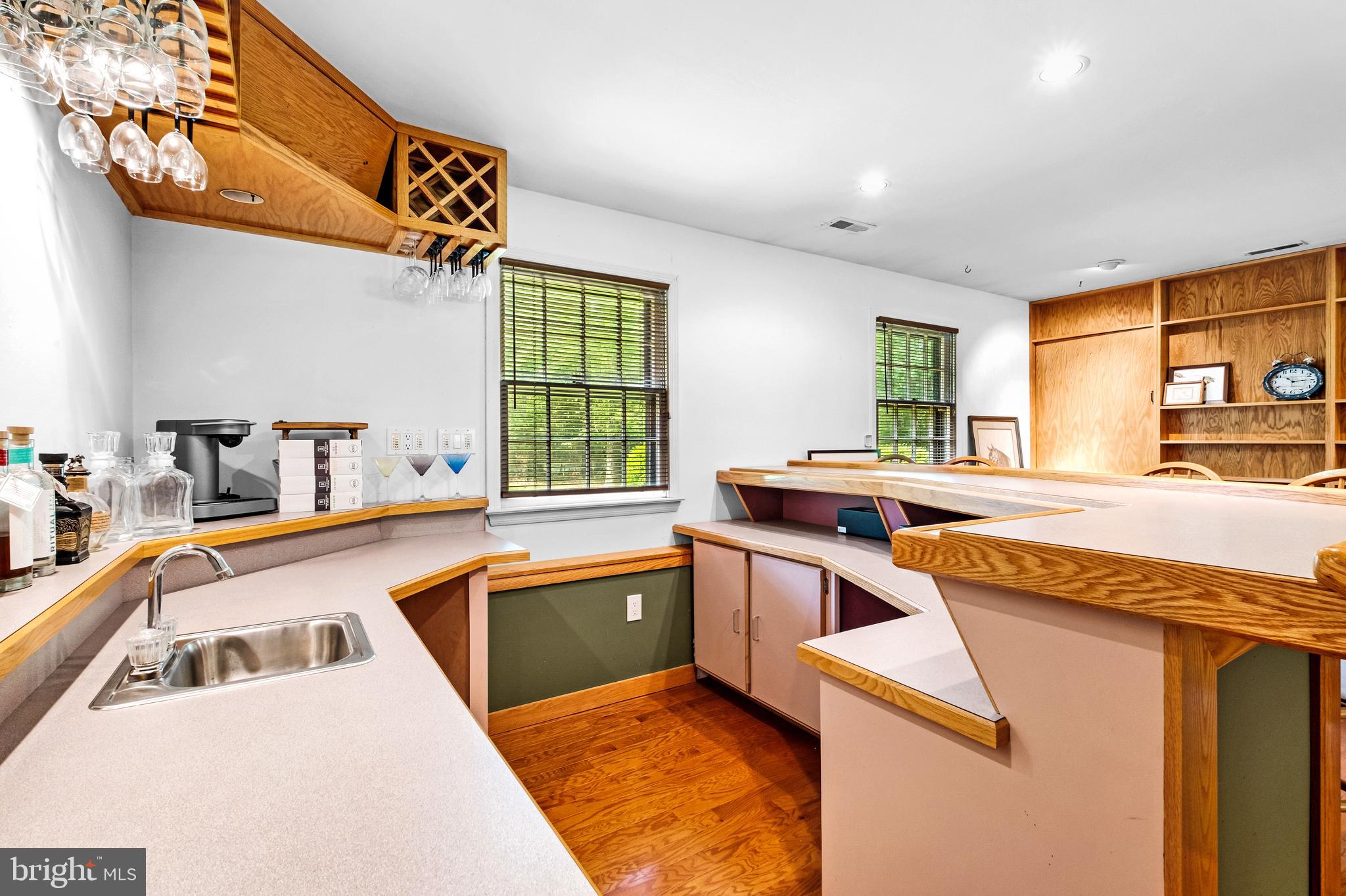 46 Grassy Lake Road Shamong, NJ 08088 - Photo 28 of 47 a kitchen that has a sink a stove and a table in it