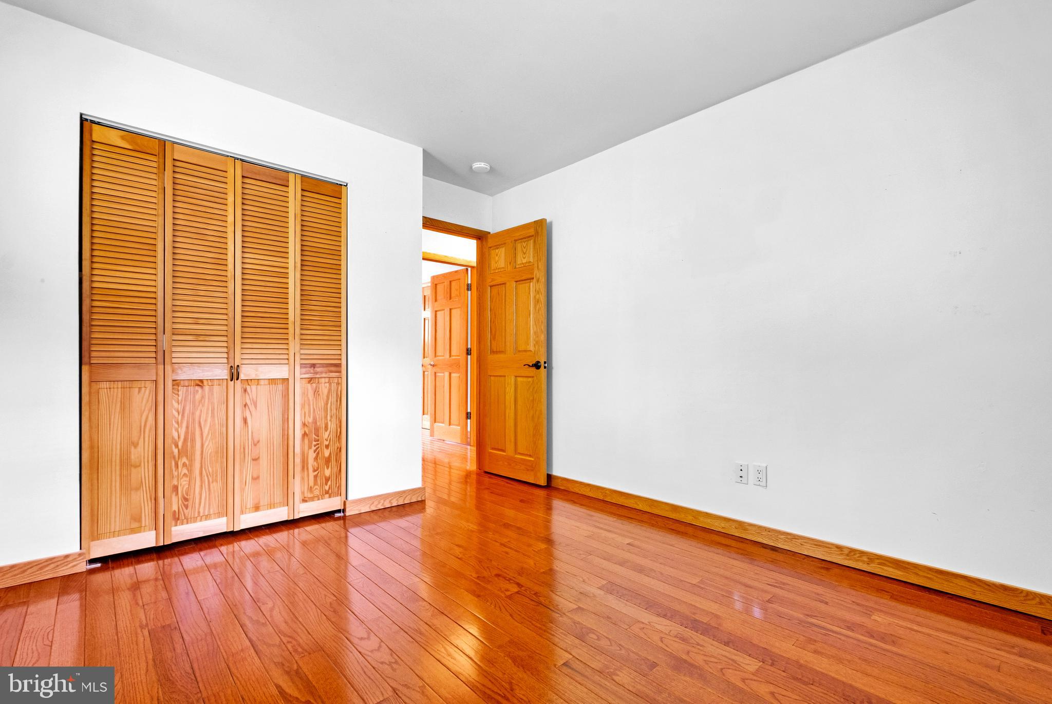 46 Grassy Lake Road Shamong, NJ 08088 - Photo 31 of 47 a view of empty room with wooden floor and fan