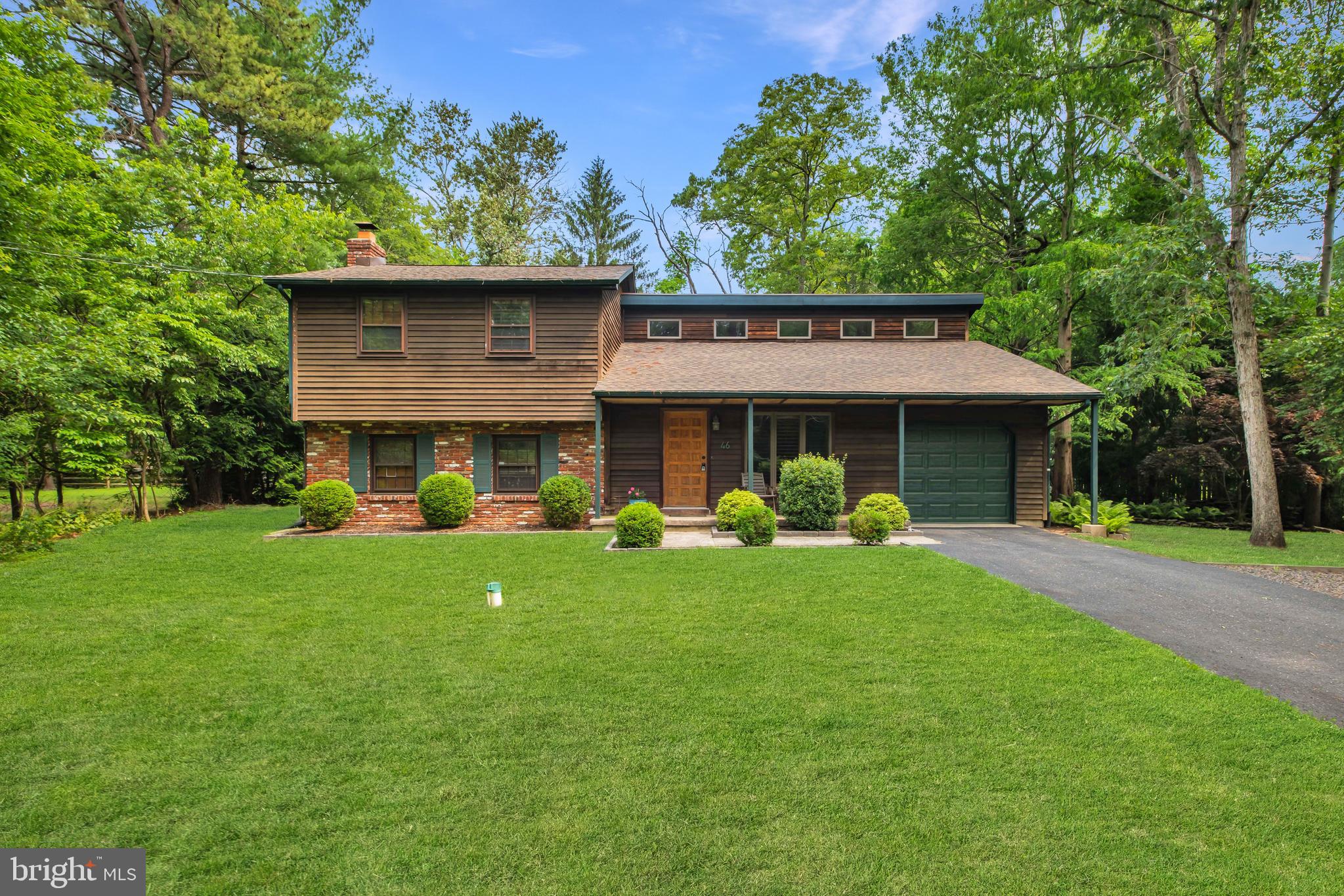 46 Grassy Lake Road Shamong, NJ 08088 - Photo 47 of 47 a view of a house with a yard and sitting area