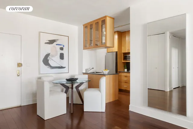 a bed room with a bed and a night stand