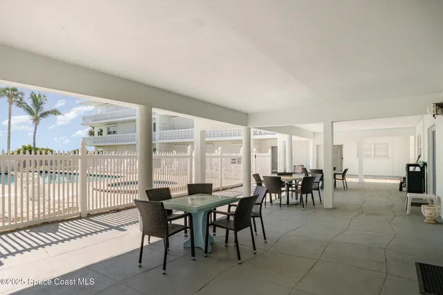 a view of a balcony with an ocean view