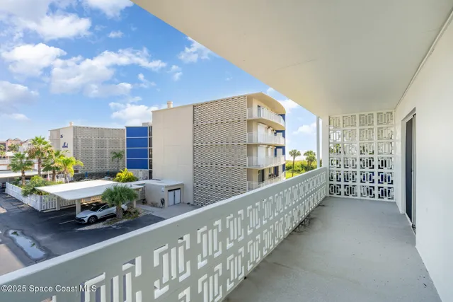 a swimming pool with outdoor seating and yard