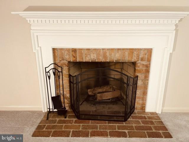1016 Windrush Lane, Unit 25 Sandy Spring, MD 20860 - Photo 16 of 37 Wood fireplace with classic charm.