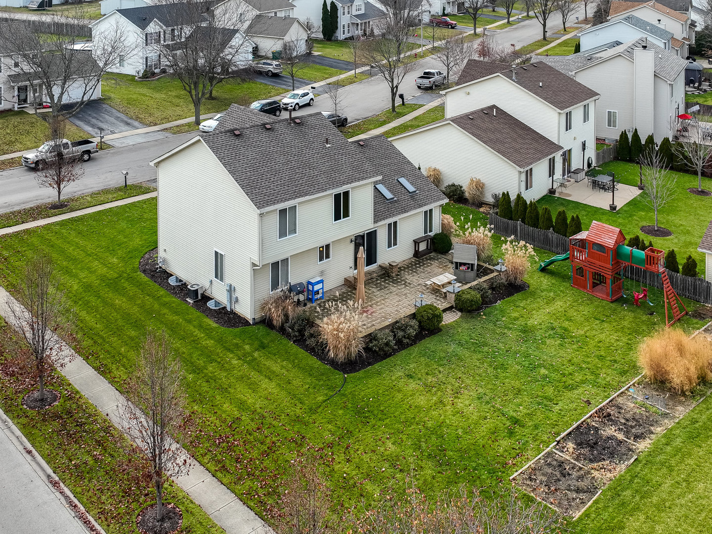 5519 Stonybrook Drive Plainfield, IL 60586 - Photo 18 of 27 a aerial view of a house with swimming pool garden and patio