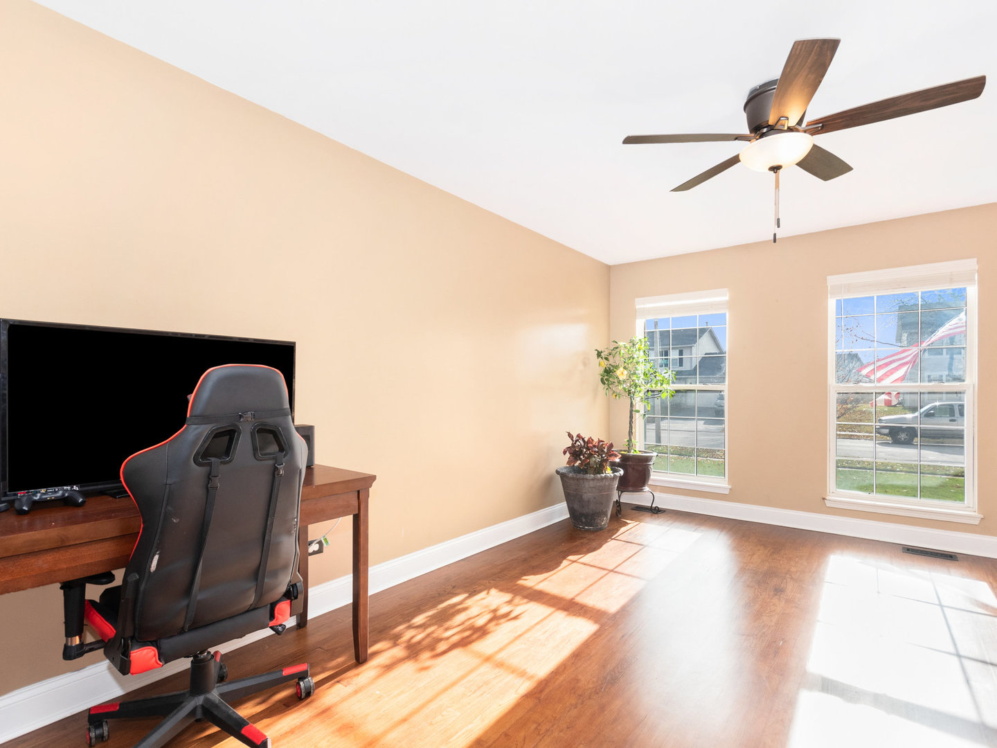 5519 Stonybrook Drive Plainfield, IL 60586 - Photo 10 of 27 a living room with furniture and a window
