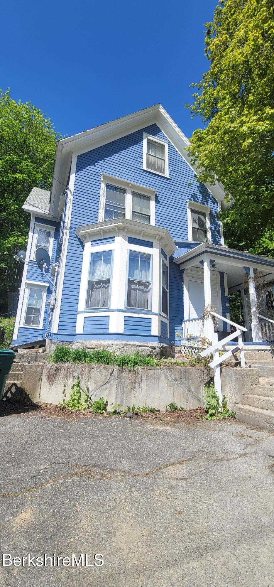 301 Walnut Street North Adams, MA 01247 - Photo 12 of 12 a front view of a house with a yard