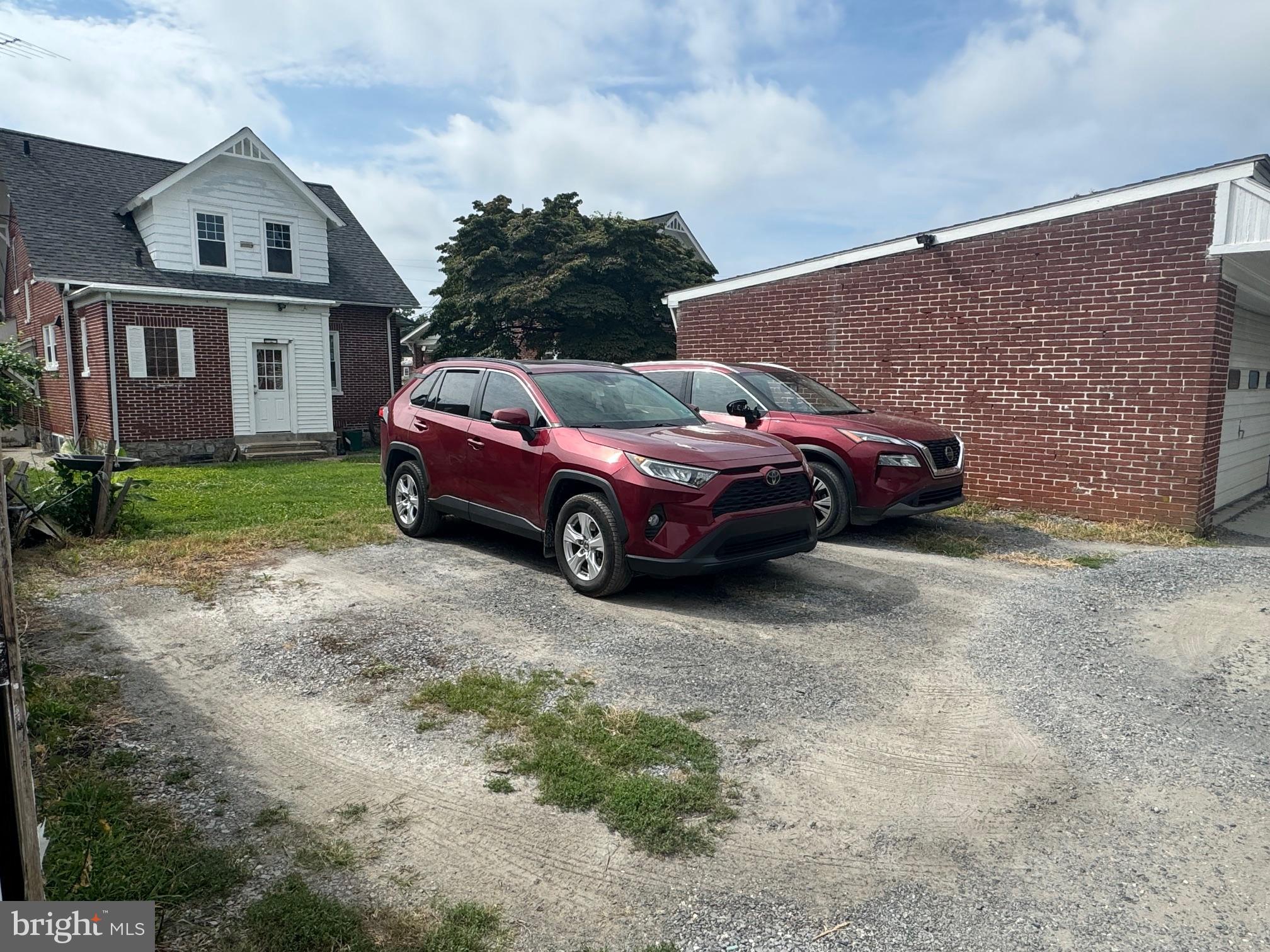 885 Manor Street Lancaster, PA 17603 - Photo 13 of 13 a front view of a house with a garden