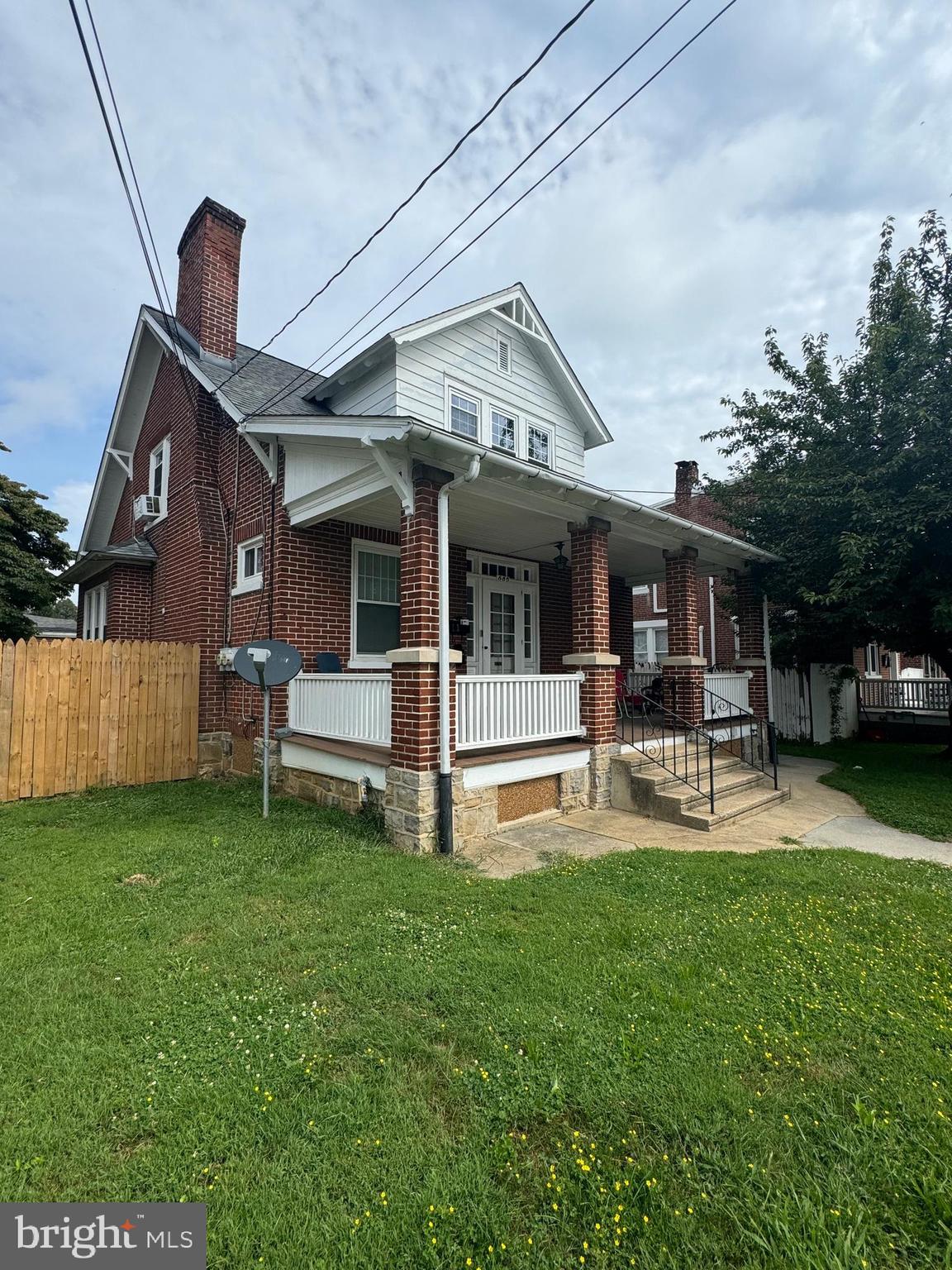 885 Manor Street Lancaster, PA 17603 - Photo 3 of 13 a house view with a sitting space and garden