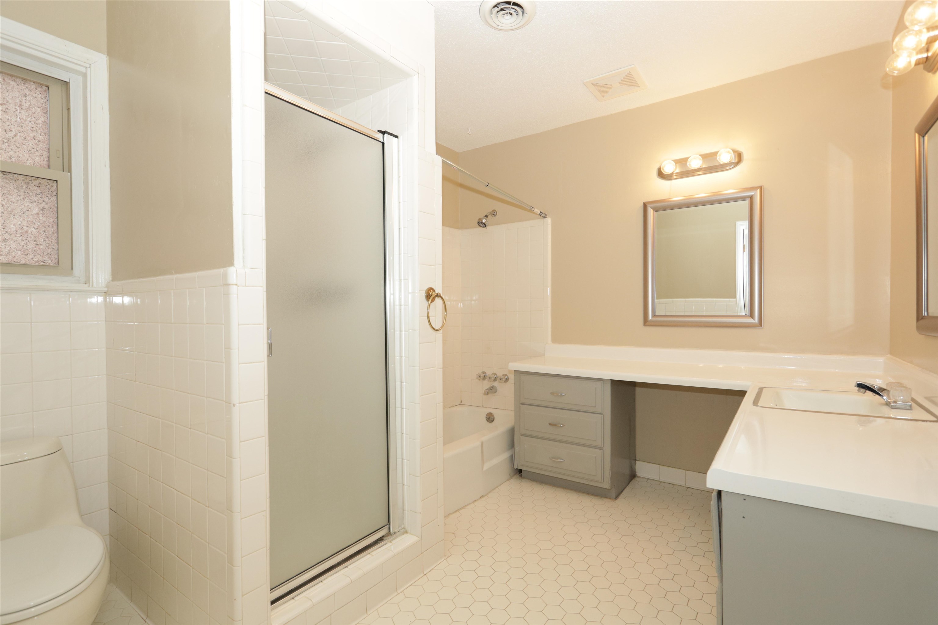 3272 Powers Road Memphis, TN 38128 - Photo 19 of 23 a bathroom with a sink a toilet and shower