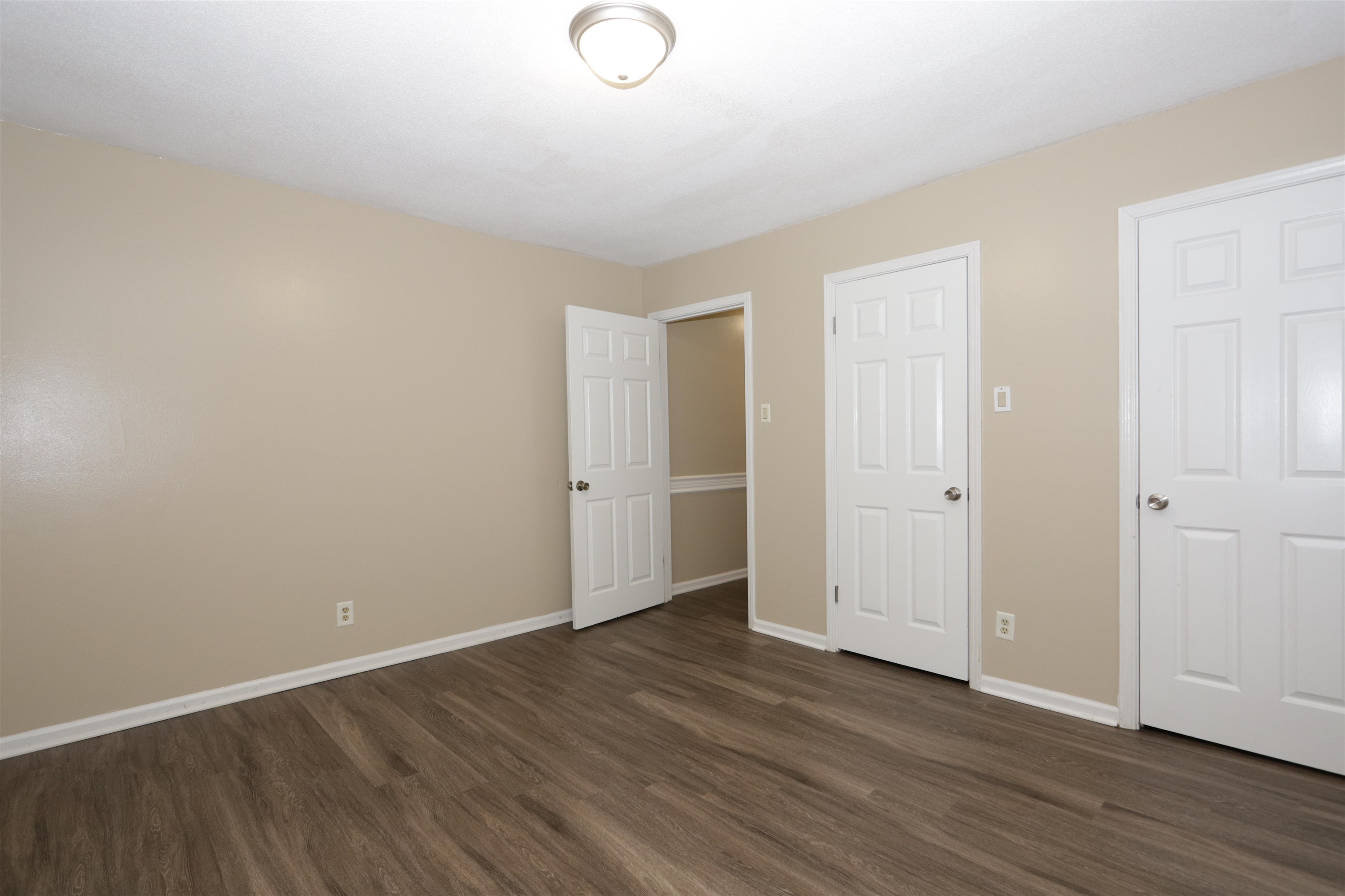 3272 Powers Road Memphis, TN 38128 - Photo 20 of 23 a view of an empty room with wooden floor